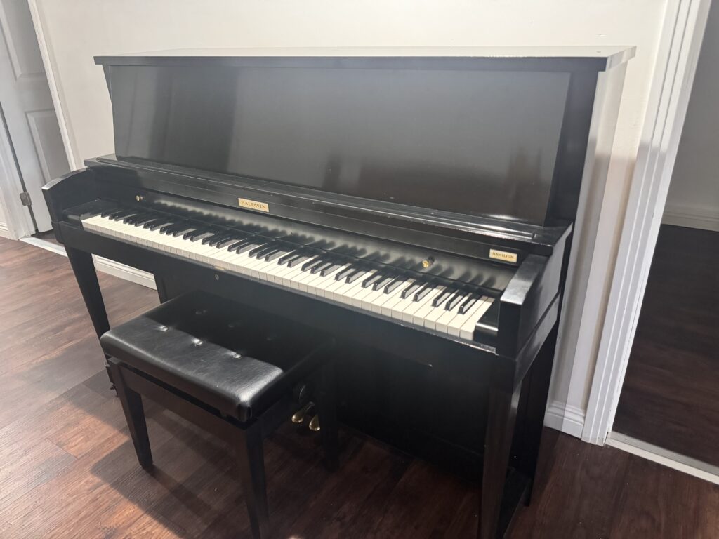 Black Baldwin 243 SE 45-inch studio upright piano at Piano Seller